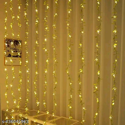 WTC 200 LED Leaf Curtain String Light | Artificial Vine Fairy Lights with Remote, 8 Modes & USB Plug for Diwali, Home, Bedroom & Garden Decoration (10x3 Ft, Warm White) - 𝚅𝙴𝙻𝙼𝙸𝚁𝚁𝙰