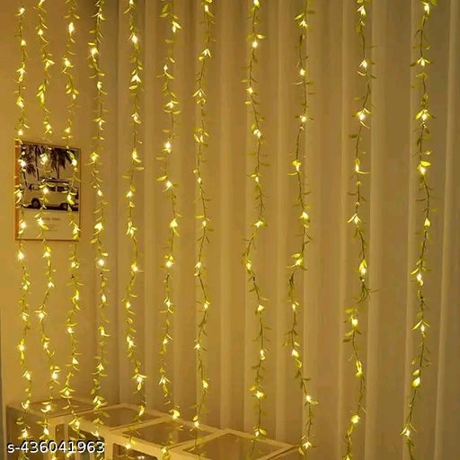 WTC 200 LED Leaf Curtain String Light | Artificial Vine Fairy Lights with Remote, 8 Modes & USB Plug for Diwali, Home, Bedroom & Garden Decoration (10x3 Ft, Warm White) - 𝚅𝙴𝙻𝙼𝙸𝚁𝚁𝙰